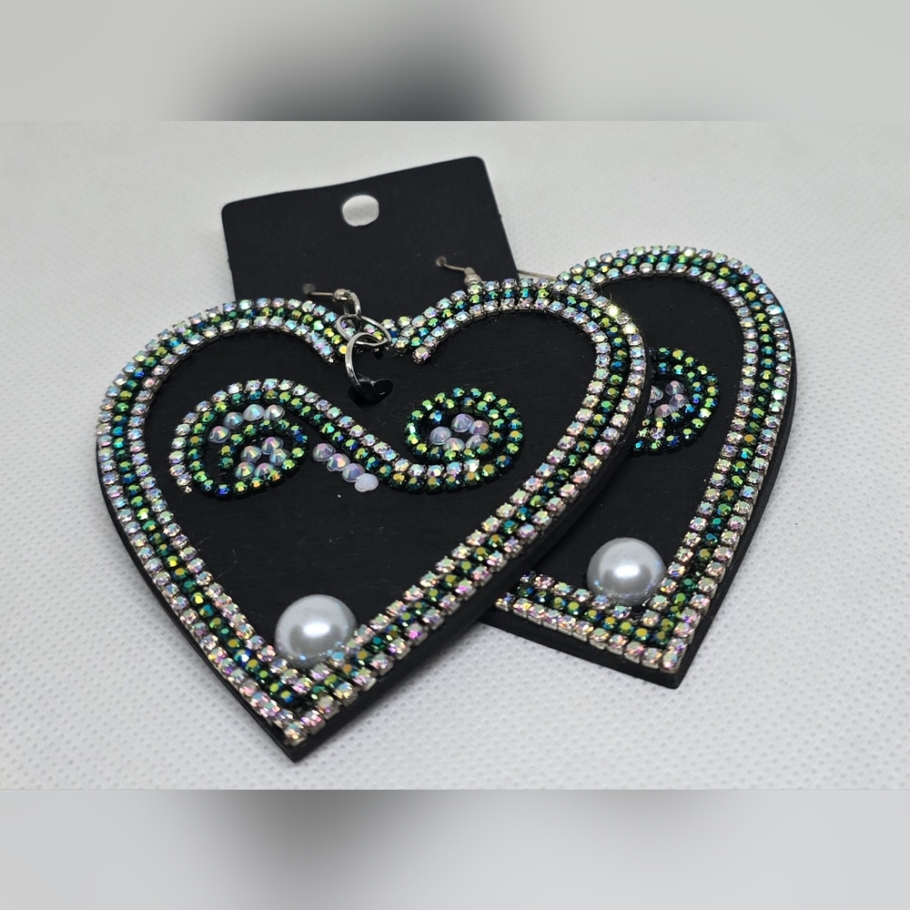 Black heart shaped earrings with bling